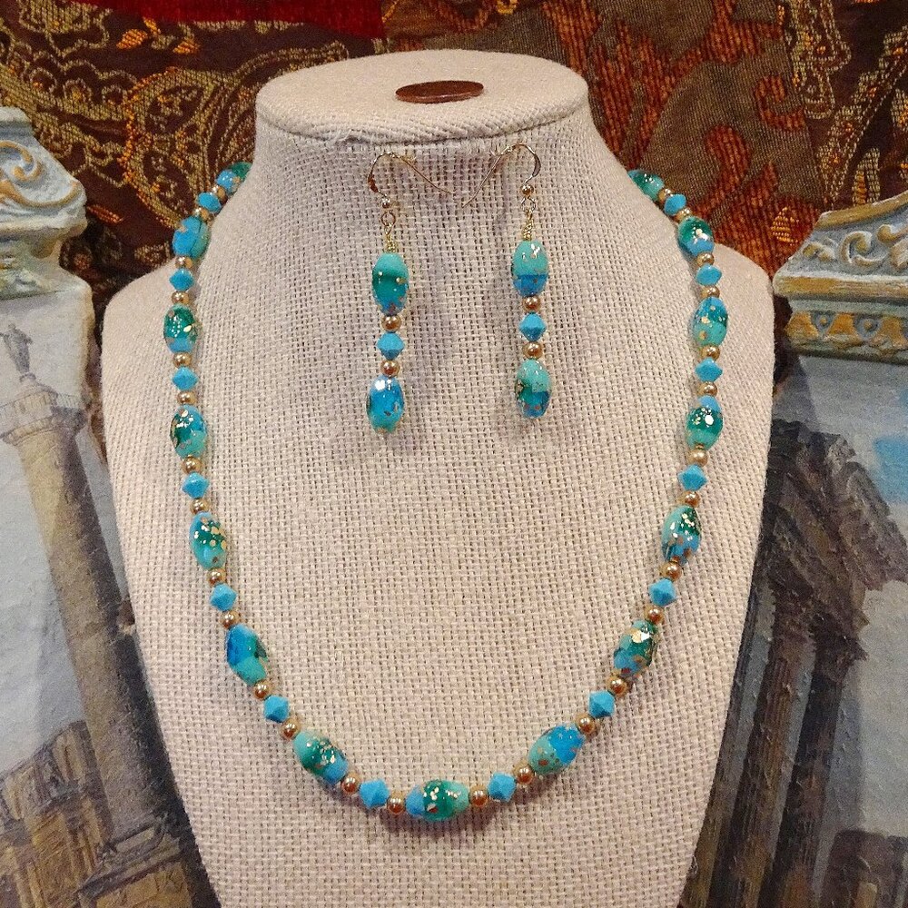 Handcrafted necklace/earring set in cerulean and gold colors evoking sun and sea